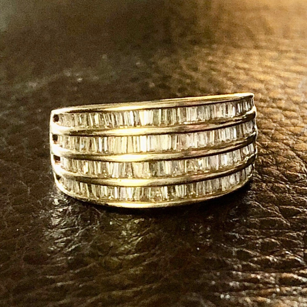 14kt yellow gold 4 row channel set baguettes ring